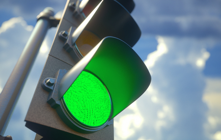 Traffic light with green light on, signal open to go ahead.の写真素材