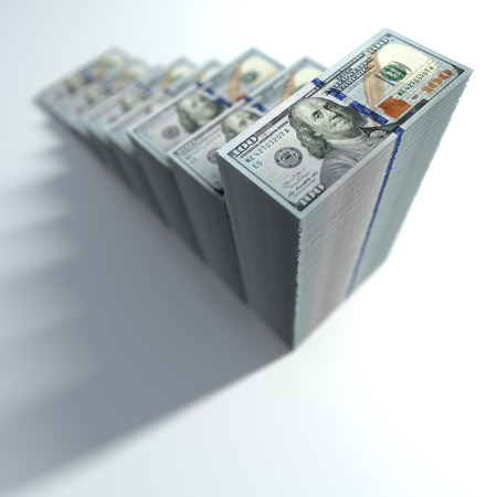 Dollar bills stacked in shape of growing bar chart. Concept of success in business.の写真素材