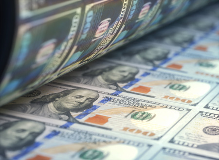 Printing US dollar bills.