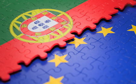 Flag of the Portugal and the European Union in the form of puzzle pieces in concept of politics and economic union.の写真素材