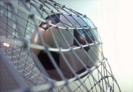 Soccer ball, scoring the goal and moving the net.の写真素材