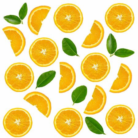 Orange fruit slices with leaves pattern on white background.