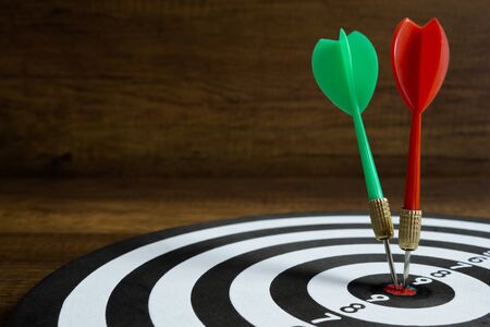 Darts, green and red, embroidered in the center of the dart board,Business concept, goals and achievements of the organization.の写真素材