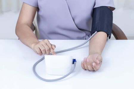 Female check blood pressure. Health care and Medical concept