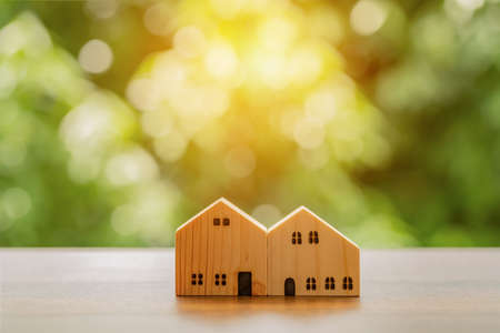 Wooden house model with beautiful nature background.の写真素材