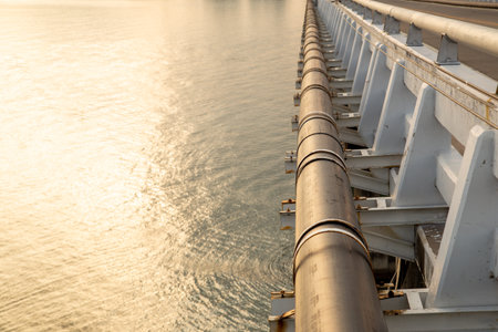 Pipe is installed along the bridge on the pipe support.の写真素材