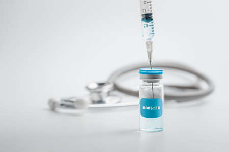 Syringe with liquid vaccines booster. fight against virus , Vaccination and immunization....