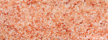 Background of pink Hymalayan salt close-up view from aboveの写真素材