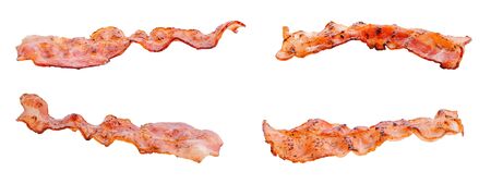 Four slices of fried bacon at various angles isolated on white backgroundの写真素材