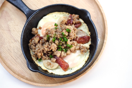 panned egg topping with sausage porkの写真素材