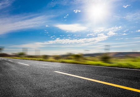curved  highway and blue skyの写真素材
