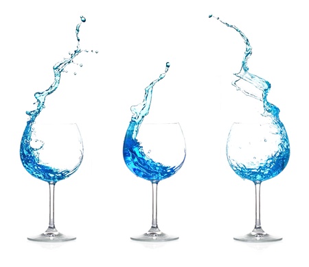 Splash blue cocktail on white backgroundの写真素材