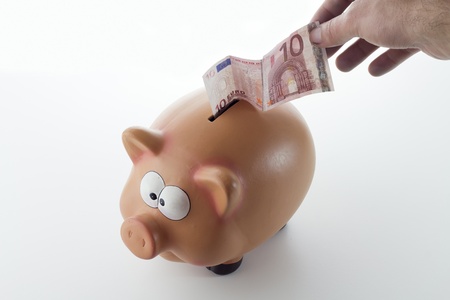Piggy moneybox on white backgroundの写真素材