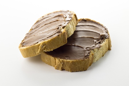 bread with chocolate cream isolated on white backgroundの写真素材