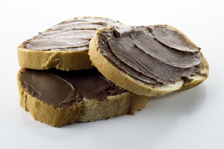 bread with chocolate cream isolated on white backgroundの写真素材