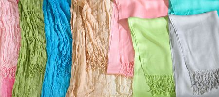 Colorful clothes hanged for drying after laundry の写真素材