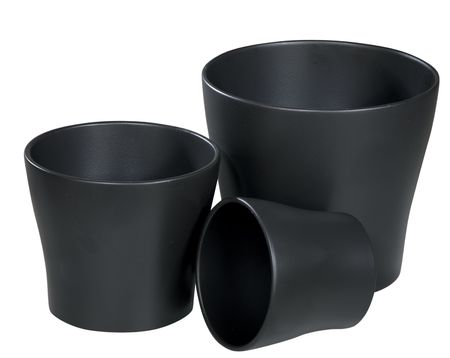 A group of decorative flower pots isolated on a white background の写真素材