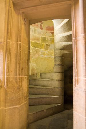 doorway with steep staircage inside stone towereの写真素材