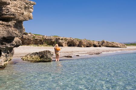 a beutiful woman on the beach in Mediterraneanの写真素材