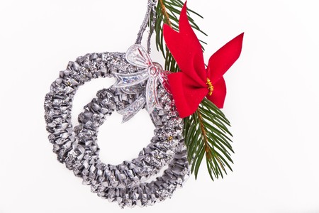 decorated christmas-tree branch with bowの写真素材