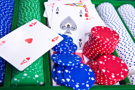 colorful poker chips with ace cardのeditorial素材