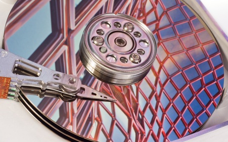 close up of hard disk with abstract reflection