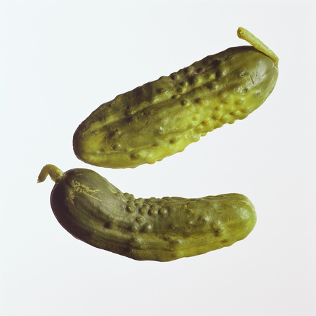 slices of cucumber on white backgroundの写真素材