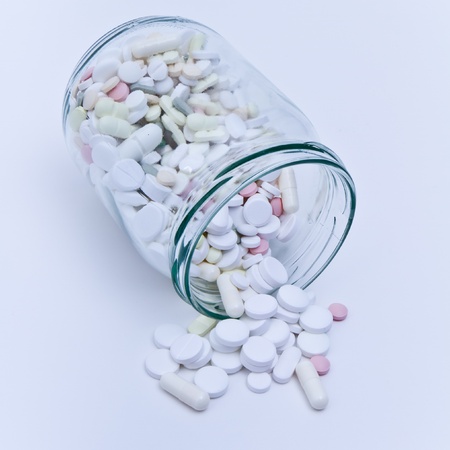 pills and tablets in glass containerの写真素材