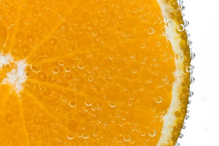 mandarine coverd with bubbles isolatedの写真素材