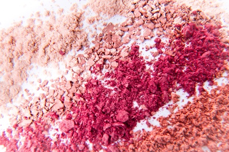 makeup powder in three colors on white backgroundの写真素材