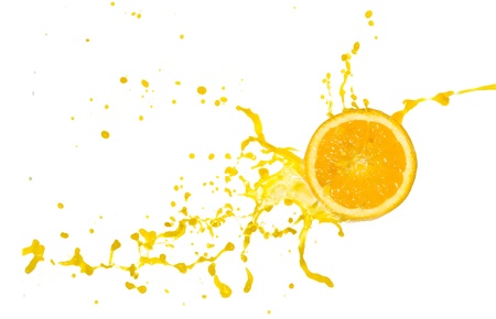orange juice splash isolated on white backgroundの写真素材