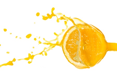 orange juice splash isolated on white backgroundの写真素材