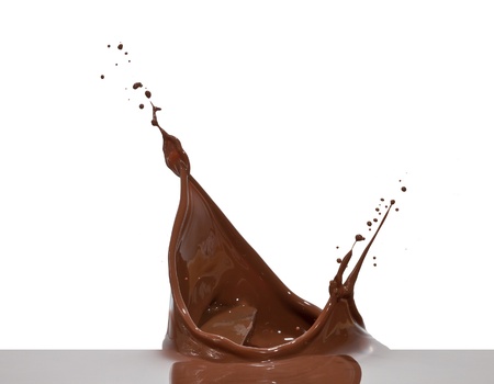 chocolate splash closeup isolated on white backgroundの写真素材