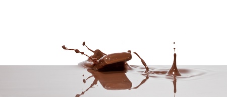 chocolate splash closeup isolated on white backgroundの写真素材