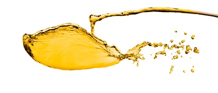 orange juice splash isolated on white backgroundの写真素材