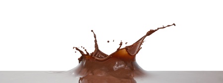 chocolate splash closeup isolated on white backgroundの写真素材