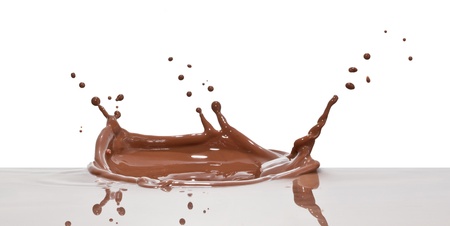 chocolate splash closeup isolated on white backgroundの写真素材