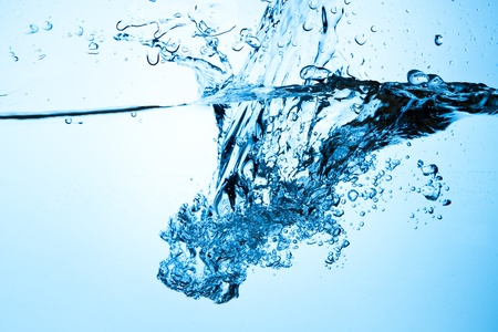 closeup of bubbles in blue waterの写真素材