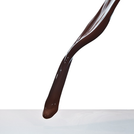 splash of chocolate isolated on white backgroundの写真素材