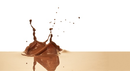 chocolate splash closeup isolated on white backgroundの写真素材