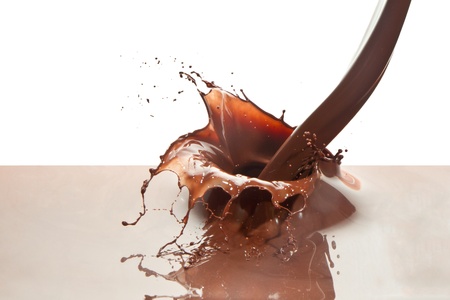 splash of chocolate isolated on white backgroundの写真素材