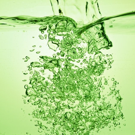 green soda drink with bubblesの写真素材