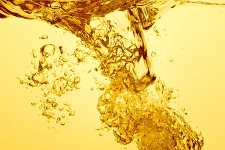 orange summer drink with bubblesの写真素材