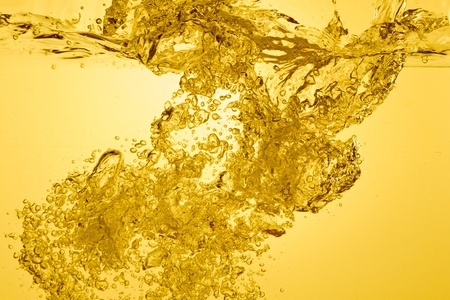 orange summer drink with bubblesの写真素材