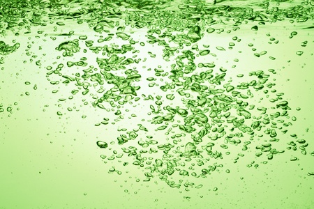 green soda drink with bubblesの写真素材