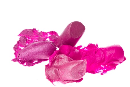 crushed lipsticks isolated on white backgroundの写真素材
