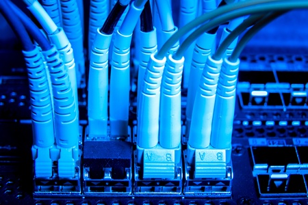 optic fiber cables connected to data centerの写真素材