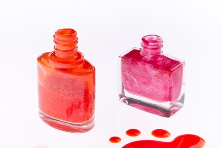 spilled nail polish isolated on white background