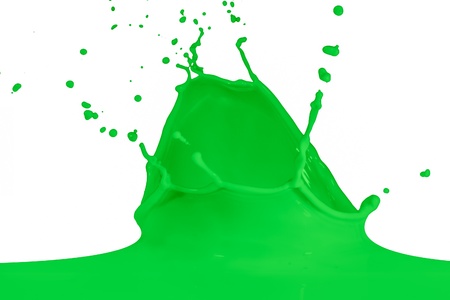 green paint splashing on whiteの写真素材