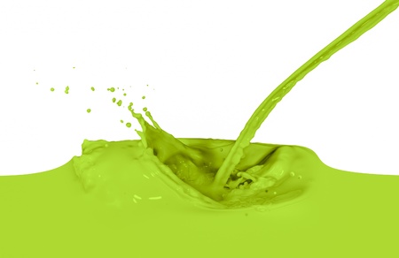 green paint splashing on whiteの写真素材